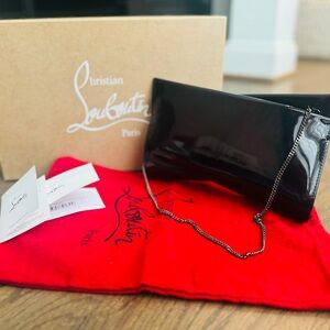 CHRISTIAN LOUBOUTIN Loubitwist Small patent leather clutch